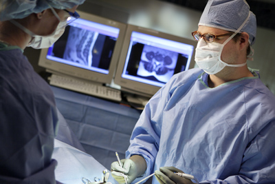 Neurologist performing a procedure